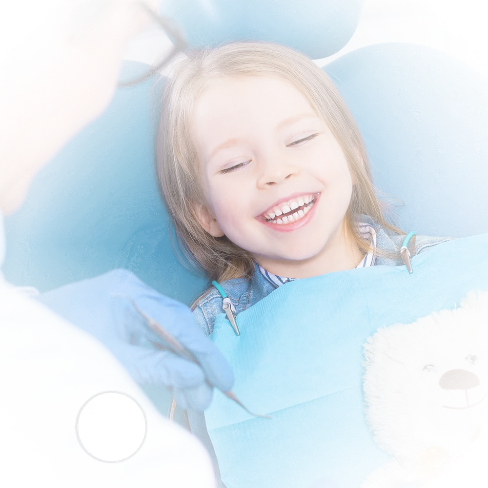 image of a child with a nitrous oxide nozzle enjoying sedation dentistry while at the dental office