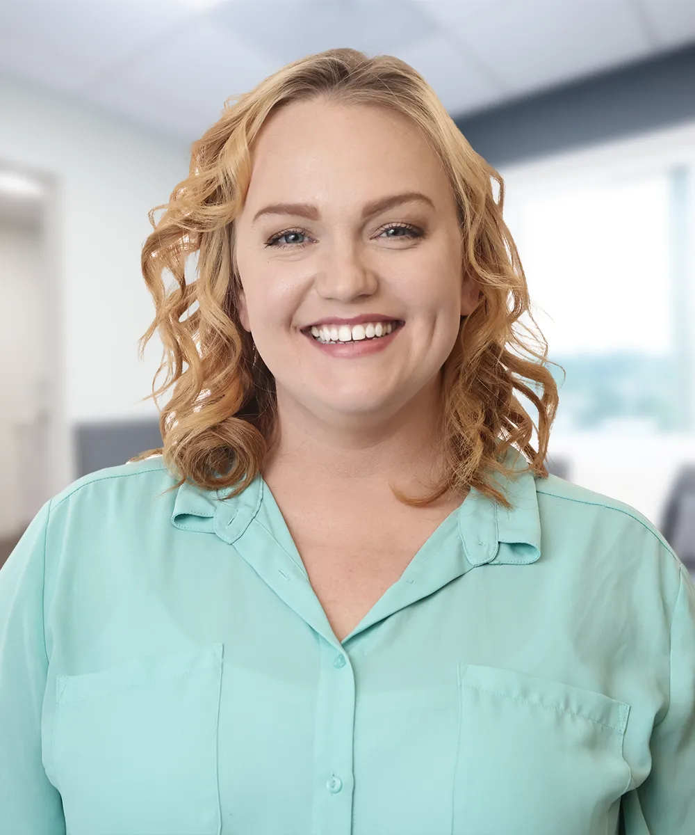 A headshot of Colleen Z., smiling warmly, representing a satisfied patient from Vartanian Dental Group.