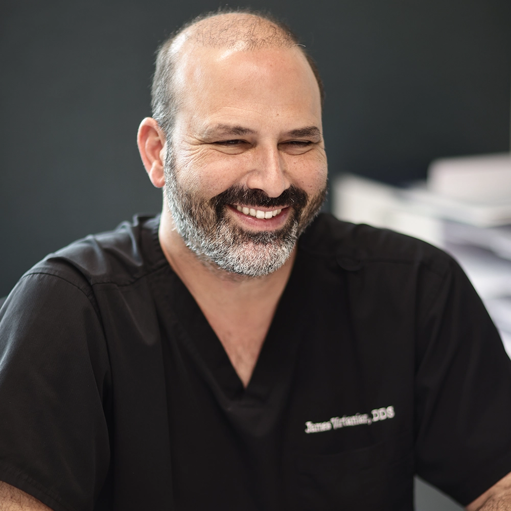 Dr. James Vartanian has been defining excellence in the field of cosmetic dentistry from his practice in Mission Viejo for the past 12 years. With 26 years of experience in dentistry, he has honed his skills to provide top-notch dental care. As a graduate of the USC School of Dentistry, he knows that a beautiful, healthy smile is key to feeling great. He offers a range of cosmetic procedures, including porcelain veneers, metal-free crowns and bridges, implants, and reconstructive dentistry. He is currently a visiting faculty member at the Spear Institute in Scottsdale, one of only 100 dentists chosen to hold this special privilege.
Dr. Vartanian has been married for 20 years and is the proud father of six children. His commitment to his family mirrors his dedication to his patients, as he strives to create a welcoming and supportive environment for everyone who visits his practice.
Dr. Vartanian’s team is dedicated to providing the best quality dentistry. They continually attend education courses and receive advanced training to stay updated on the latest technology.